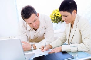 Couple writing together Couple writing together